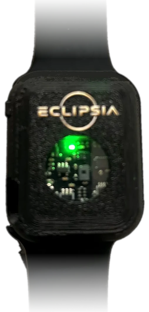 The Eclipsia prototype — a black wrist-worn band with an exposed sensor board and a lit green indicator.